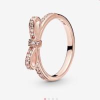 PANDORA Rose Gold Sparkling Bow Ring £23.99 delivered @ Pandora